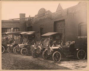 Row of Automobiles in Unidentified Lot by William G. Swekosky